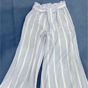 Blue and white trousers.